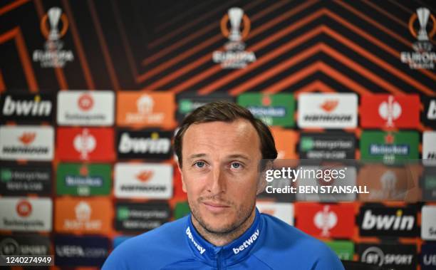 West Ham United's English midfielder Mark Noble attends a press conference at West Ham United's training ground in east London, on April 27 on the...