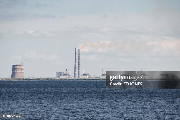 General view shows the Zaporizhzhia nuclear power plant, situated in the Russian-controlled area of Enerhodar, seen from Nikopol in April 27, 2022.