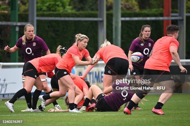 Natasha Hunt of England offloads the ball during the England Red Roses Training Session at Stade Saint-Jean on April 27, 2022 in Anglet, France.