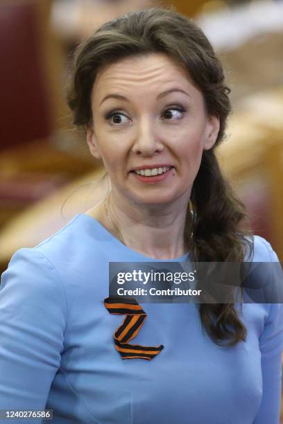 Russian State Duma Deputy Chairman Tatyana Kuznetsova wearing "Z" sign in support of military invasion on Ukraine, smiles during the Council of...