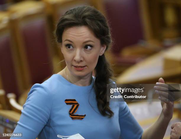 Russian State Duma Deputy Chairman Tatyana Kuznetsova wearing "Z" sign in support of military invasion on Ukraine, smiles during the Council of...