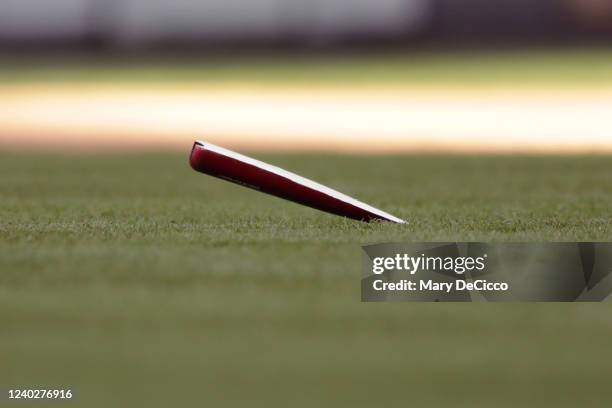 Detail shot of a splintered broken bat on the field during the game between the Boston Red Sox and the New York Yankees at Yankee Stadium on Friday,...