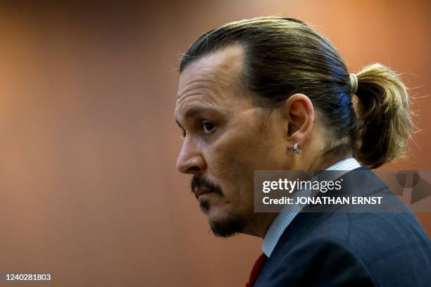 Actor Johnny Depp attends his defamation trial against his ex-wife Amber Heard, at the Fairfax County Circuit Courthouse in Fairfax, Virginia, April...