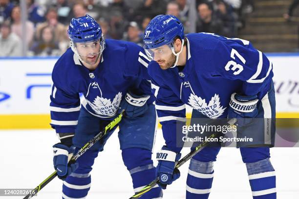 Toronto Maple Leafs Center Colin Blackwell and Defenceman Timothy Liljegren in the face-off circle during the regular season NHL game between the...