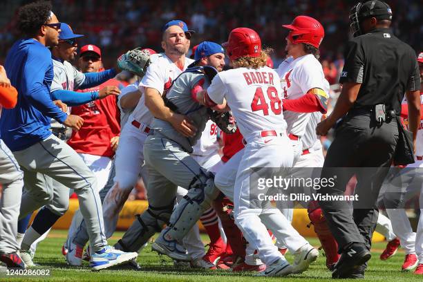 Paul Goldschmidt of the St. Louis Cardinals attempts to restrain Tomas Nido of the New York Mets after the benches cleared in the eighth inning at...