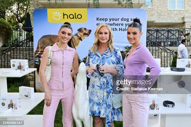 Dixie D'Amelio, Kathy Hilton, and Charli D'Amelio attend a Celebration to Shine A Light On Dog Safety With Halo Collar on April 26, 2022 in Los...