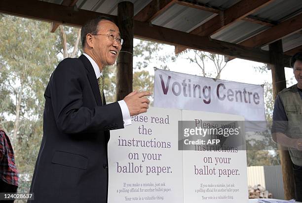 Secretary-General Ban Ki-Moon inspects a simulated voting centre during a visit to the International Deployment Group complex in Canberra on...