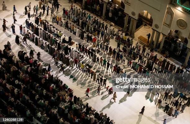 Muslim worshippers pray on Laylat al-Qadr during the holy month of Ramadan, at the Al-Azhar Mosque in the Egyptian capital Cairo, on April 27, 2022.