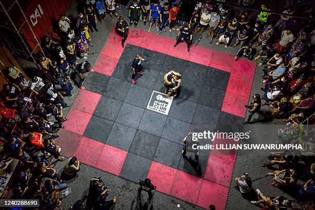 Fight Top View TOPSHOT - This aerial photo taken on April 16, 2022 shows combatants ...