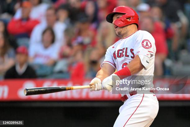 Mike Trout of the Los Angeles Angels doubles in a run in the first inning against the Cleveland Guardians at Angel Stadium of Anaheim on April 27,...