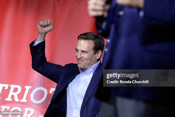 Republican Senate candidate from Nevada Adam Laxalt pumps his fist while Florida Governor Ron DeSantis endorses him at a campaign event at Stoneys...