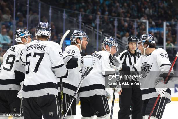 Lias Andersson of the Los Angeles Kings celebrates with teammates after scoring a goal against the Seattle Kraken to take a 4-3 lead during the third...