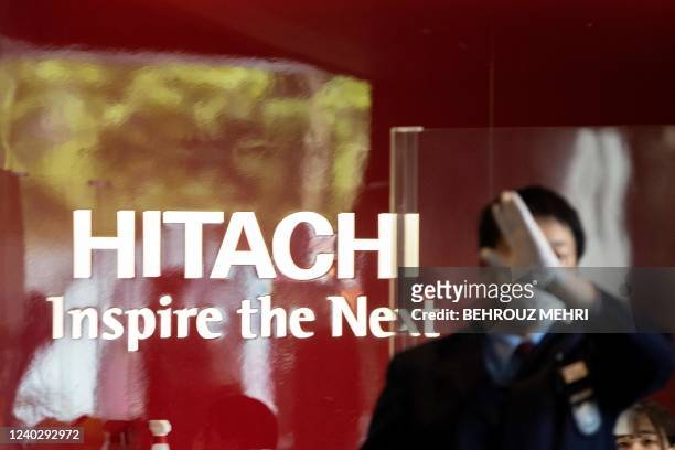 Logo of Hitachi is pictured at the lobby of its headquarters in Tokyo on April 28, 2022.