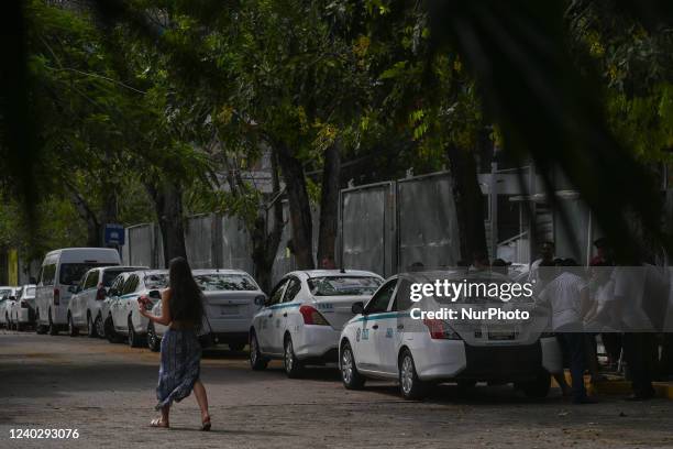 Line of taxis waiting for customers near Fifth Avenue in Playa del Carmen. On Wednesday, 27 April 2022, in Playa Del Carmen, Quintana Roo, Mexico.