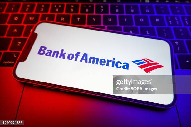 In this photo illustration, the Bank of America Corp logo seen displayed on a smartphone screen.
