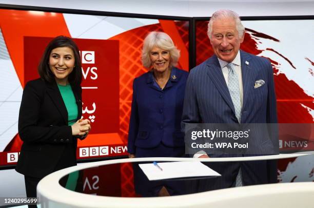 Britain's Prince Charles and Camilla, Duchess of Cornwall are pictured with Sana Safi BBC Afghan Senior Presenter while visiting a tv studio at BBC...