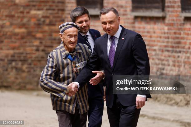 Polish President Andrzej Duda and Polish Consul General Adrian Kubicki welcome Auschwitz survivor Edward Mosberg to lay a wreath during The March of...
