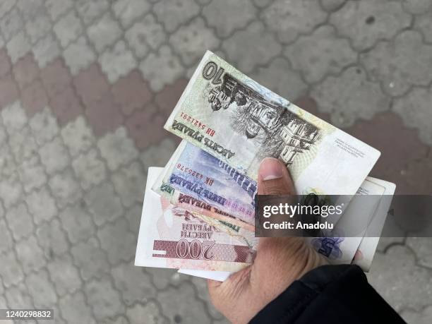 Person show banknotes in Tiraspol, the so-called capital of the Transnistria on April 28, 2022. Transnistria, one of the "frozen crises" in the...