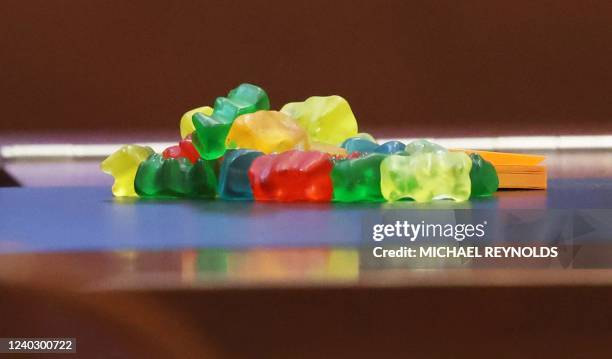 Pile of Gummy Bears in front of US actor Johnny Depp's seat during the 50 million US dollar Depp vs Heard defamation trial at the Fairfax County...