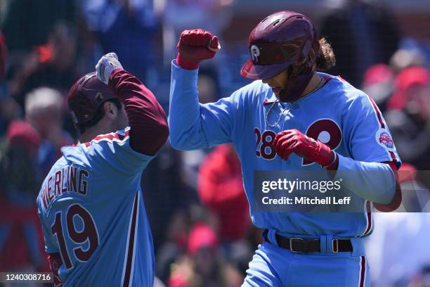 Alec Bohm of the Philadelphia Phillies celebrates with Matt Vierling after hitting a solo home run in the bottom of the fourth inning against the...