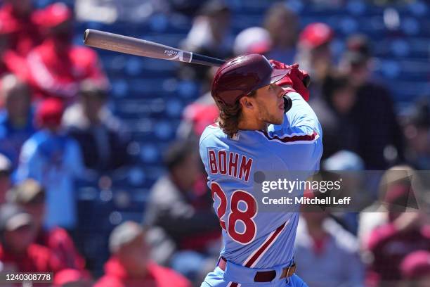 Alec Bohm of the Philadelphia Phillies hits a solo home run in the bottom of the fourth inning against the Colorado Rockies at Citizens Bank Park on...