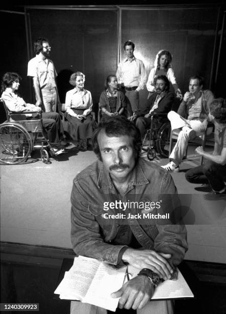 Portrait of playwright Arthur Kopit with the cast of his play 'Wings,' among them is Constance Cummings , at the Manhattan's Public Theater, New...