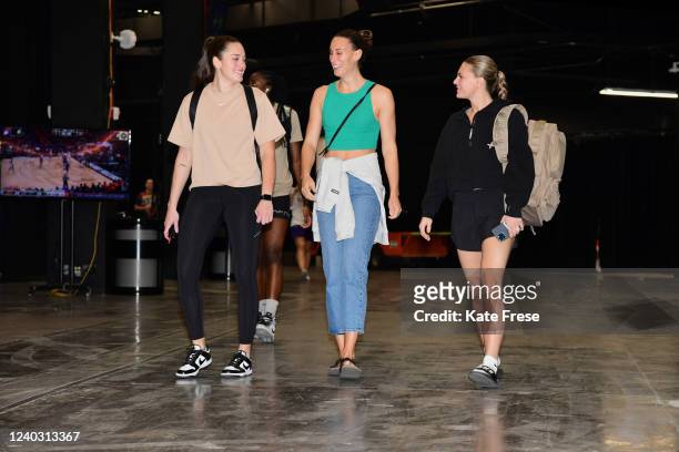 Jenna Giacone, Stephanie Talbot, and Paisley Harding of the Seattle Storm arrive to the arena before the game against the Phoenix Mercury during a...