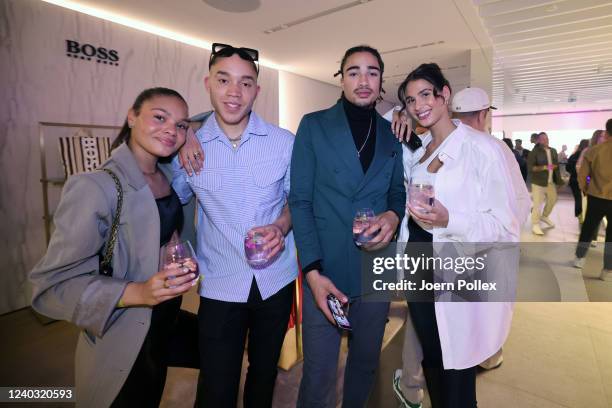 Guests attending the 110 years Alsterhaus birthday party at Alsterhaus on April 28, 2022 in Hamburg, Germany.