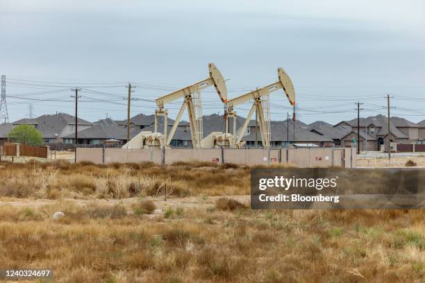 Pumpjacks located near a residential neighborhood in Midland, Texas, U.S. On Monday, April 4, 2022. West Texas, the proud oil-drilling capital of...