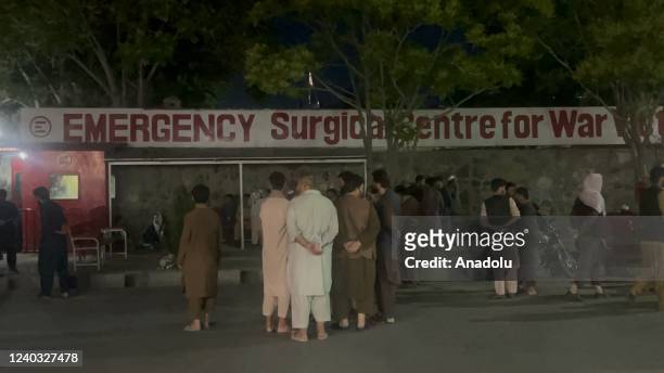 Wounded people are dispatched to hospitals after a bomb exploded in a mosque in the Afghan capital Kabul during Friday prayers on April 29, 2022. At...