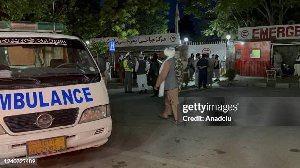 Wounded people are dispatched to hospitals after a bomb exploded in a mosque in the Afghan capital Kabul during Friday prayers on April 29, 2022. At...