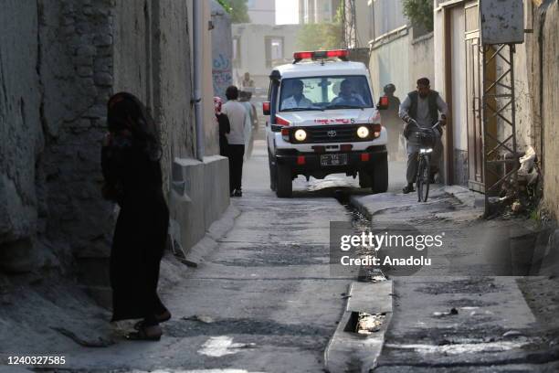 An ambulance is seen after a bomb exploded in a mosque in the Afghan capital Kabul during Friday prayers on April 29, 2022. At least 10 people were...