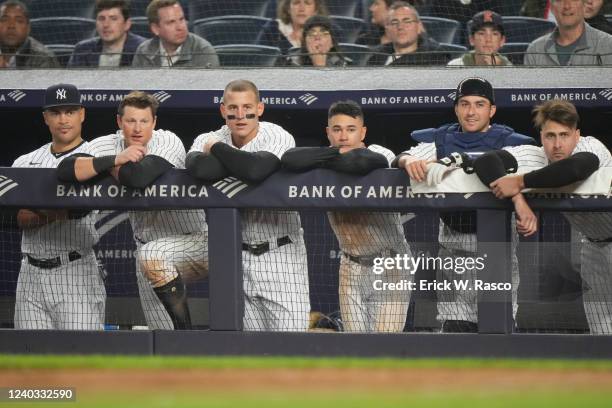 New York Yankees DJ LeMahieu , Kyle Higashioka, Isiah Kiner-Falefa watching from the dugout vs Baltimore Orioles at Yankee Stadium. Bronx NY...