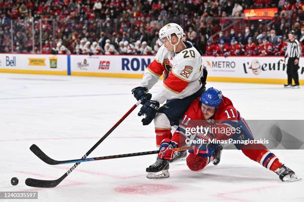 Brendan Gallagher of the Montreal Canadiens challenges Aleksi Heponiemi of the Florida Panthers during the second period at Centre Bell on April 29,...