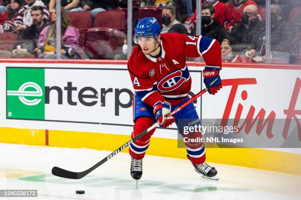 Nick Suzuki of the Montreal Canadiens controls the puck against the Florida Panthers in the NHL game at the Bell Centre on April 29, 2022 in...