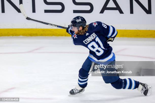 Kyle Connor of the Winnipeg Jets takes a shot on goal during first period action against the Calgary Flames at the Canada Life Centre on April 29,...