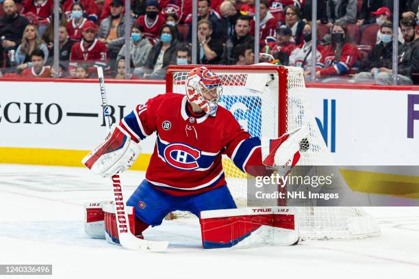 Goaltender Carey Price of the Montreal Canadiens makes a glove save against the Florida Panthers in the NHL game at the Bell Centre on April 29, 2022...