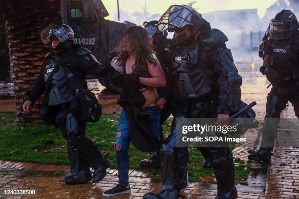 Protester is being arrested by Riot police during the demonstration. Students clashed heavily with riot police at BogotÃ¡ university as they marched...