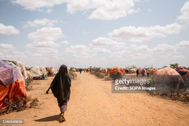 Camp on the outskirts of Dollow, where people displaced by the ongoing drought have gathered. People from across Gedo in Somalia have been displaced...