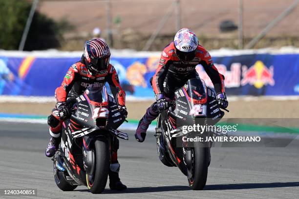 Aprilia Spanish rider Maverick Vinales and Suzuki Spanish rider Alex Rins take part the third practice session of the MotoGP Spanish Grand Prix at...