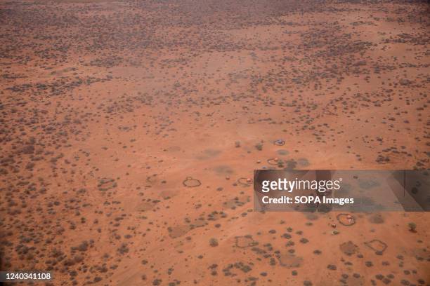 The dry landscape in Gedo, Somalia, as seen from a plane. People from across Gedo in Somalia have been displaced due to drought conditions and forced...