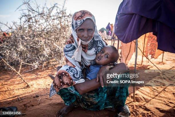 Halima Ismael Ibrahim, a single mother of ten children, left home to search for aid during Somalia's drought. People from across Gedo in Somalia have...