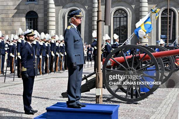 Sweden's King Carl XVI Gustaf and his son Prince Carl Philip attend celebrations with military ceremony for the King's birthday at Stockholm Palace...