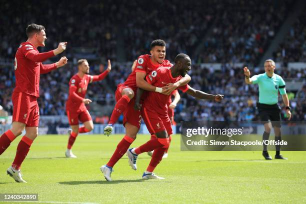 Naby Keita of Liverpool celebrates with Luis Diaz of Liverpool after scoring their 1st goal during the Premier League match between Newcastle United...