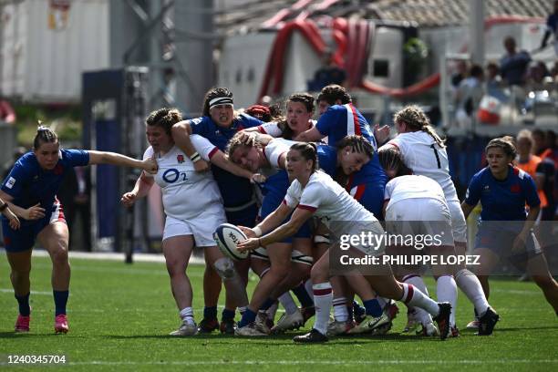 England's scrum-half Leanne Infante clears the ball during the Six Nations international women's rugby union match between France and England at Jean...