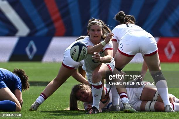 England's scrum-half Leanne Infante clears the ball during the Six Nations international women's rugby union match between France and England at Jean...