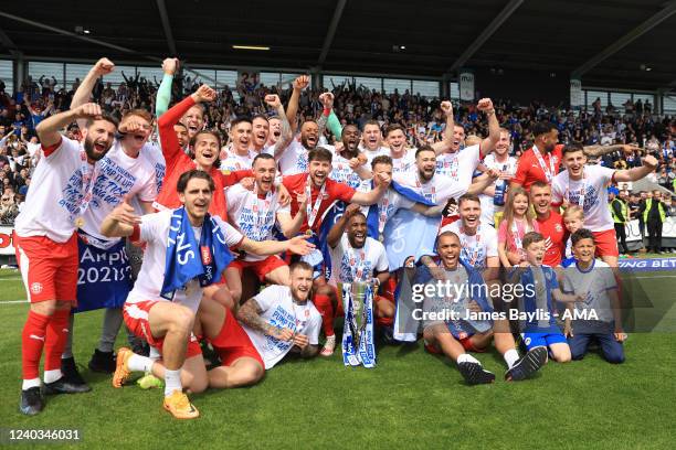 The players of Wigan Athletic celebrate winning Sky Bet League One and winning promotion to the Championship after the Sky Bet League One match...