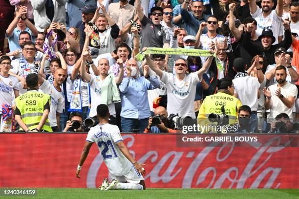 Real Madrid's Brazilian forward Rodrygo celebrates after scoring his team's first goal during the Spanish League football match between Real Madrid...