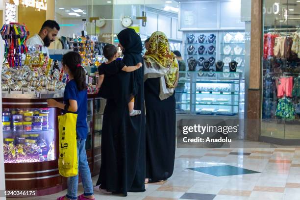 People do shopping ahead of the Eid Al-Fitr in Dubai, United Arab Emirates on April 30, 2022.