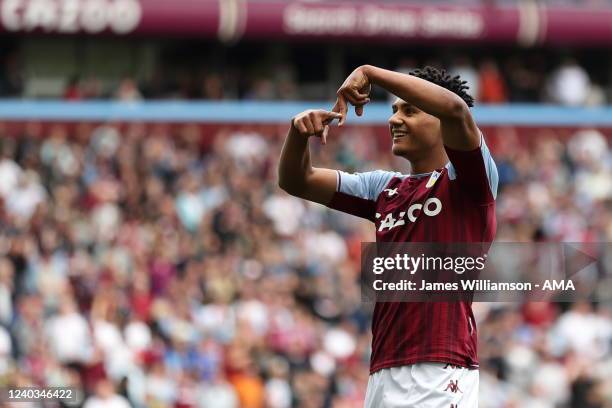 Ollie Watkins of Aston Villa celebrates after scoring a goal to make it 1-0 during the Premier League match between Aston Villa and Norwich City at...